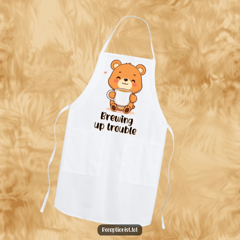 Funny bear apron with a smiling character offering a warm cup of tea, a charming and humorous kitchen accessory for tea enthusiasts.