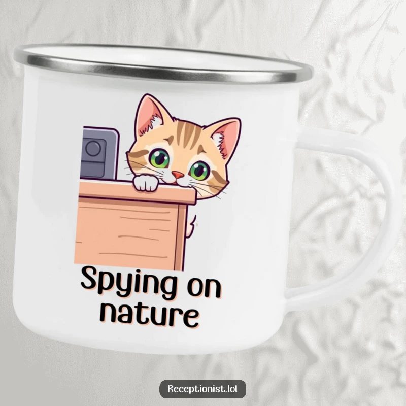 Funny cat camping mug with a curious kitten peeking over a desk, ideal for outdoor enthusiasts who love a good laugh.