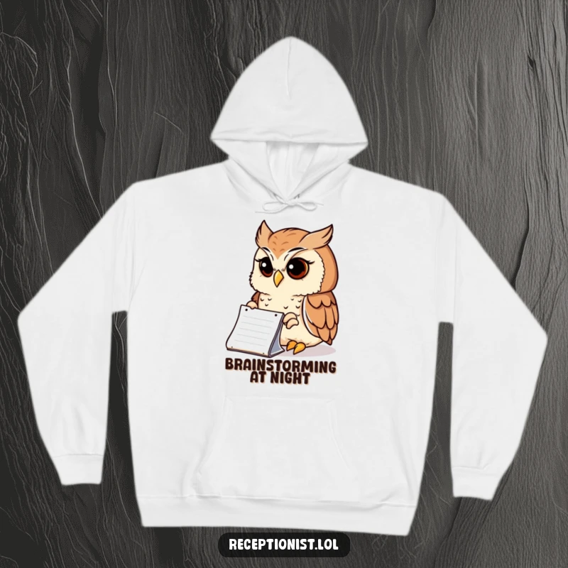 Funny Hoodie with a wise owl peering intently at a notepad with a serene expression, comfortable and humorous for deep thinkers.