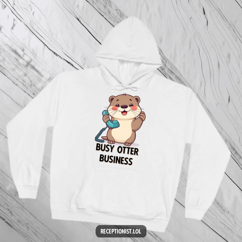 Funny Otter Hoodie with a happy otter joyfully answering a ringing telephone, embracing communication.