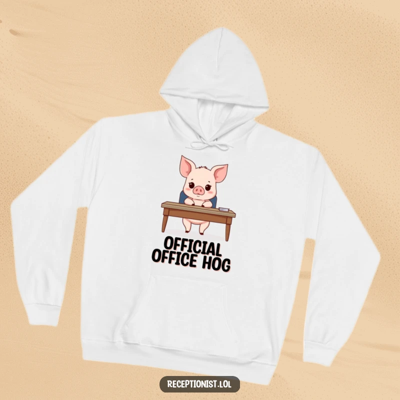 Funny Piglet Hoodie featuring a cute piglet sitting behind a desk, looking expectantly at an unseen guest, perfect for cozy, humorous vibes.