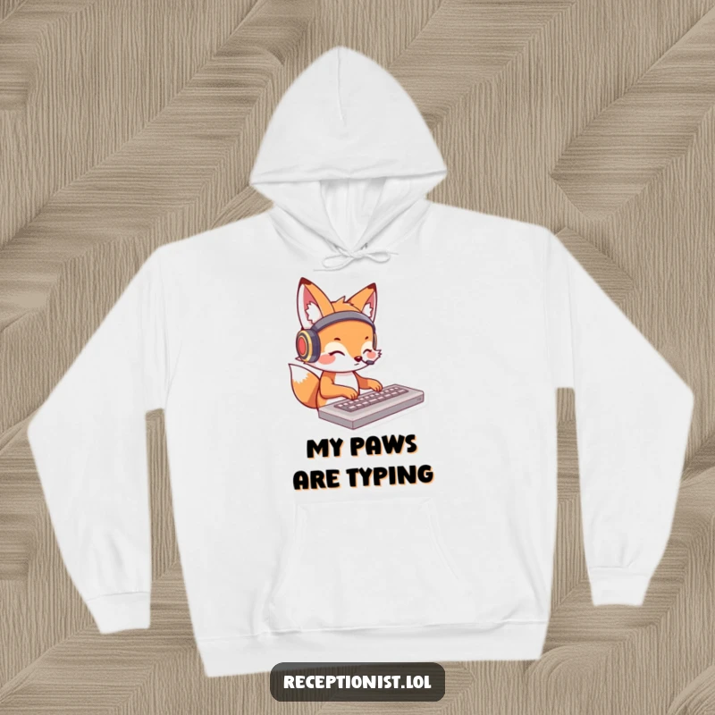 Funny fox hoodie with a charming cartoon fox wearing headphones and typing on a keyboard; comfortable and humorous apparel.