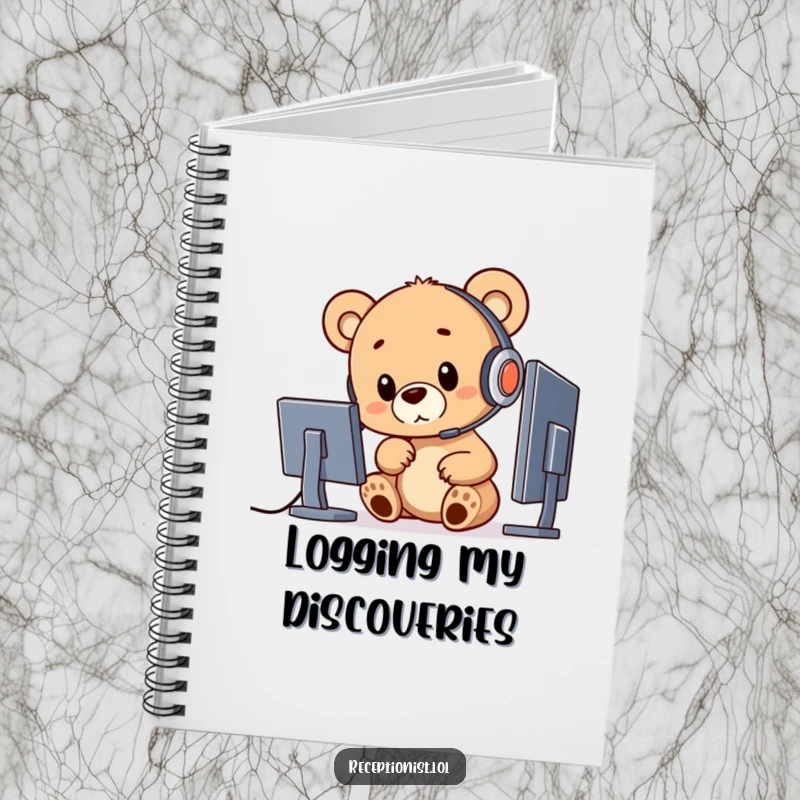 Funny bear cub with a headset pointing at a computer, featured on a notebook cover for study or work.