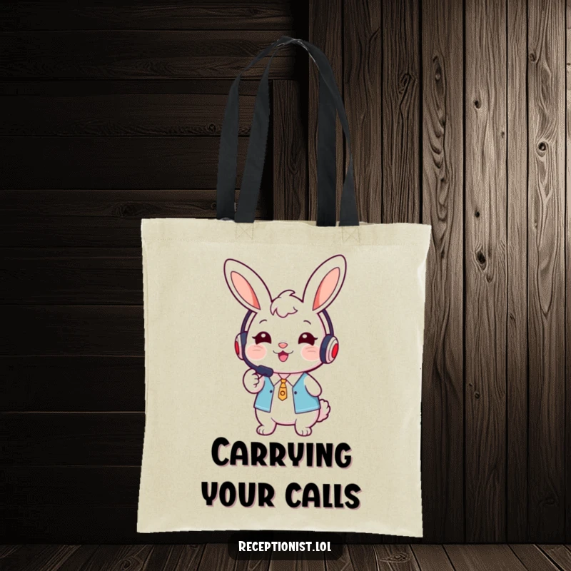 Funny cute bunny receptionist wearing a headset, smiling warmly and pointing forward on a tote bag.