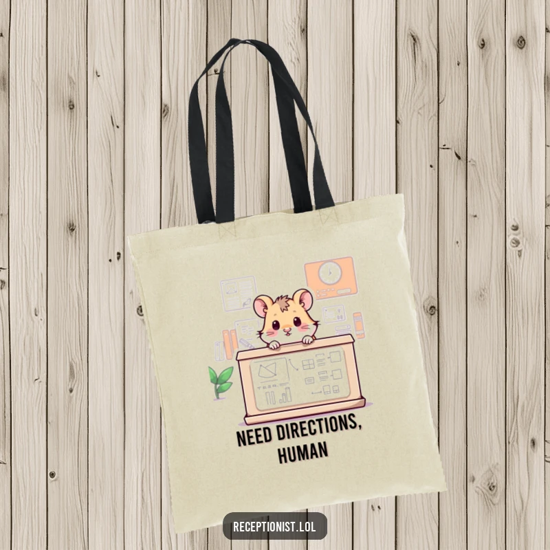 Funny tote bag displaying a miniature hamster curiously peeking over a large information desk, ideal for carrying humor.